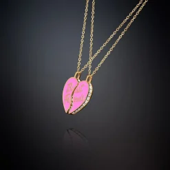 PAIR OF NECKLACES WITH PINK HALF HEART PENDANTS